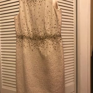 Beaded dress. No tags but never worn. Size 12.